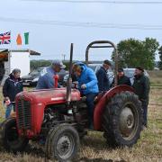Picture shows Jim Mawer, chairman of The Odd Wheel Club, trying to teach Catherine Cranwell how to plough.