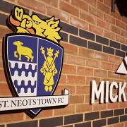 St Neots Town exited the FA Cup with a 3-0 defeat at Bedford Town.