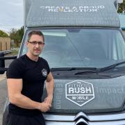 The owner of Fitness Rush, Liam Rushmer, with the mobile gym that will be used to help deprived communities and the homeless.