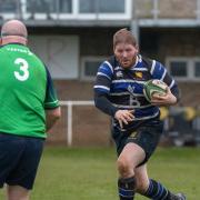Number 8 Paul Ashbridge makes a break during the defeat to Buckby.