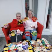 Volunteers Lily and Valerie knitted hundreds of glove puppets to go in the shoeboxes to be sent to Ukraine, Moldova and Romania.