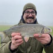St Ives Tackle's Adam Bartlett with a 2lb 6oz Chub he caught in the River Great Ouse.