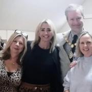(From L to R) the vaccination centre's team Jackie Baker, Jo Shirreffs, Gini Melisi, Caz Henderson and Jannette Fitzpatrick, with mayor of St Neots, Cllr Ben Pitt, at the farewell.