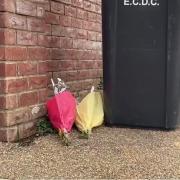 Floral tributes have been left outside a home in The Row, Sutton, where a man was fatally shot last night (March 29).