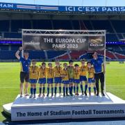 Hemingford Colts with their medals from the Europa Cup tournament played in PSG's stadium in France.