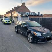 A man was arrested in connection with interfering with a motor vehicle and theft in Yaxley on Monday.