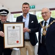 Pat Harrington with Deputy  Lord Lieutenant Daryl Brown and Cllr Phil Pearce.