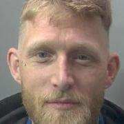Drug dealer Ashton Smyrk has been jailed for biting off an innocent man’s ear.