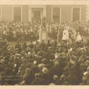 Postcard showing the unveiling of the Huntingdon War Memorial on Market Hill by N Brown.  Huntingdonshire Archives