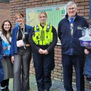 Police officers in St Neots received Christmas treats from members of The Church of Jesus Christ and St Neots and District Branch Royal Naval Association.