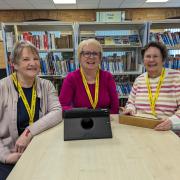 Kay Stanness, Sandra Brazier and Linda Friend volunteer as Digital Buddies at St Neots Library.
