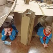 The Scouts ready for a sleep in their boxes.