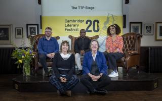 CEO and artistic director Cathy Moore (front right) at the Over the Border event with author Ali Smith (front left), writer Bernardine Evaristo (back right), former refugee and detainee Pious (back middle) and David Herd from Refugee Tales (back left)