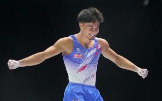 Great Britain’s Jake Jarman looks delighted after landing his second vault (Virginia Mayo/AP)