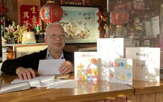 Lee Wong with his retirement cards