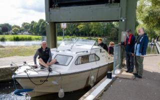 The Anglian Waterways Volunteers help boaters on the River Ouse.