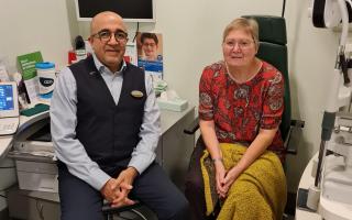Doris Phillips with optometrist Zuher Gulamhusein, who gave Doris some lifesaving help.